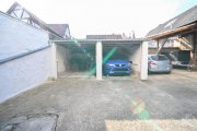 Großostheim DIETZ: Vermietetes (362qm) Wohn- & Geschäftshaus: 4 Wohneinheiten, 2 Ladenlokale & Gewölbekeller! Haus kaufen