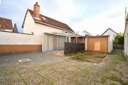 Pfungstadt DIETZ: REDUZIERT! Freistehendes Einfamilienhaus mit DO-Garage inmitten von Pfungstadt! Haus kaufen
