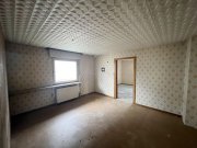 Raunheim Abrissgrundstück in zentraler Lage von Raunheim mit 2 Wohneinheiten bebaubar! Grundstück kaufen