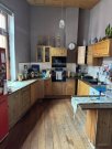 Niedernhausen Niedernhausen-Vermietetes Dreifamilienhaus mit ausbaufähiger Scheune in Königshofener Kernlage! Haus kaufen