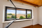 Sinsheim ATIK: Wohnen mit Weitblick: Freistehendes Einfamilienhaus in Aussichtslage mit zwei Wohnebenen Haus kaufen