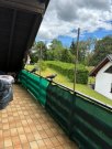 Häusern Stilvolle 2,5-Zimmer-Maisonettewohnung mit rustikalem Ambiente und viel Wohnqualität Wohnung kaufen
