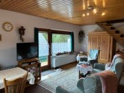 Häusern Stilvolle 2,5-Zimmer-Maisonettewohnung mit rustikalem Ambiente und viel Wohnqualität Wohnung kaufen