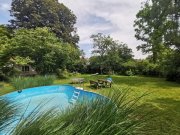 Planegg Charmante Villa mit Pool und Parkgarten – exklusives Refugium in Toplage bei München Haus kaufen