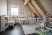 Kösching Großzügige 5-Zimmer-Maisonette-Wohnung mit Balkon und zwei Stellplätzen in gefragter Lage von Kösching bei Ingolstadt kaufen