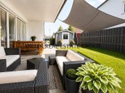 Kösching Moderne 4-Zimmer-Erdgeschosswohnung mit Privatgarten, Terrasse & zwei Tiefgaragenstellplätzen! Wohnung kaufen