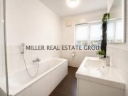 Kösching Moderne 4-Zimmer-Erdgeschosswohnung mit Privatgarten, Terrasse & zwei Tiefgaragenstellplätzen! Wohnung kaufen
