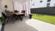 Kösching Moderne 4-Zimmer-Erdgeschosswohnung mit Privatgarten, Terrasse & zwei Tiefgaragenstellplätzen! Wohnung kaufen