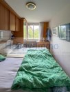 Kirchheim bei München Gepflegte, große 2-Zimmer-ETW mit verglastem Westerker & TG Platz / Verkauf auf Nießbrauchbasis Wohnung kaufen