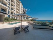 Bečići This apartment in building has an amazing location, just by beautiful Becici Beach, that was awarded a Grand Prix "Golden 