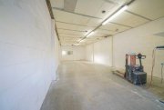 Ratingen Ebenerdige Lagerhalle mit mechanischem Tor zentral in Ratingen Gewerbe mieten