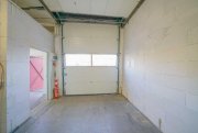 Ratingen Ebenerdige Lagerhalle mit mechanischem Tor zentral in Ratingen Gewerbe mieten