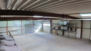 Uelsen Helle Stahlrahmen-Halle mit elektrischem Sektionaltor und großer Hofzufahrt – Industriegebiet Uelsen Gewerbe mieten