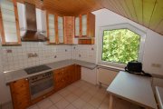 Büdingen DIETZ: Trendige 4 Zimmer-Dachgeschosswohnung im 2- Familienhaus mit Blick ins Grüne! Wohnung mieten